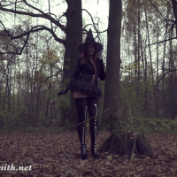 Jeny Smith wearing hot witch costume in the woods