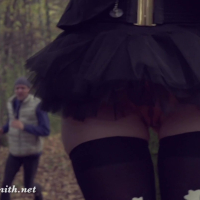 Jeny Smith wearing hot witch costume in the woods