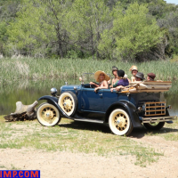 Lovely MILFs love driving in an old car by the lake