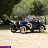 Lovely MILFs love driving in an old car by the lake