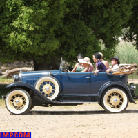 Lovely MILFs love driving in an old car by the lake