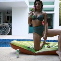 Gorgeous Melena Maria Rya having fun in her green swimsuit outdoors
