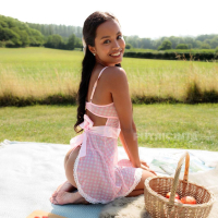 Putri Cinta has a picnic and shows her tits in the sunshine