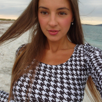 Solo babe Melena Maria Rya posing naked on the beach