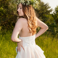 Sexy Babe Ginger Frost posing naked in a Meadow