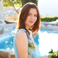 Redhead Felicia Vina shows her hairy pussy outside