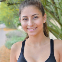 Nina North enjoys a Banana after a Run in the Park