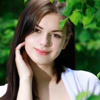 Karolina Young strips her red Underwear by a Bush
