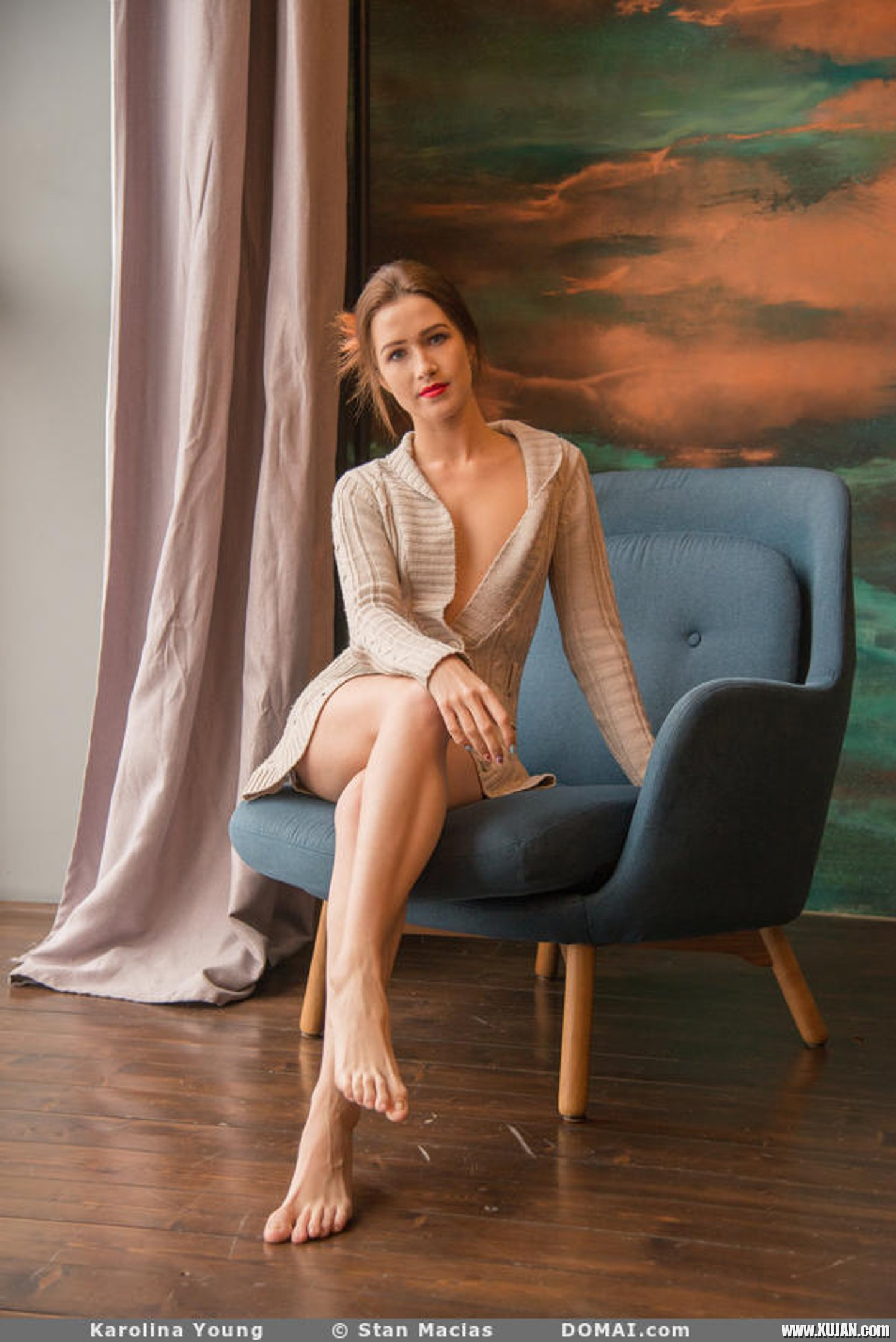 Outstanding model Karolina Young poses in armchair - Photo #3499504