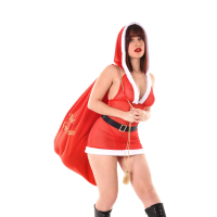 Carla Vyxx dresses as Ms Claus playing with her favorite red dildo