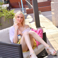 Leggy blonde Celestina Blooms shows whats under her yellow skirt