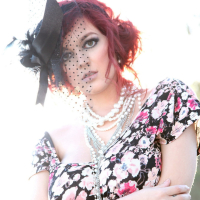 Tessa Fowler wearing a vintage Corset and Dress