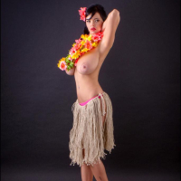 Busty model Sha Rizel is a very sexy hula girl