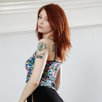 Tattooed redhead Bree Daniels flashing perfect all natural tits