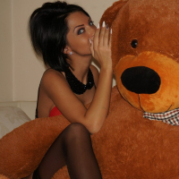 Busty Gal Anisyia XXX posing with her Teddy Bear