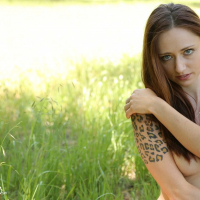 Busty Babe Lily Xo completely naked in a Meadow