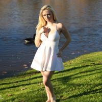 Blonde Model Lily Xo teases outdoors in sexy Dress
