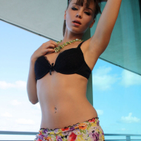 Capri Anderson gives you a strip tease on balcony