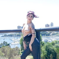 Hot babe Joanna Angel shows off her tattooed body in the outdoor scene