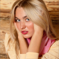 Beautiful blonde Russian teen Sweet Lilya strips in a log cabin