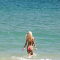 Beach voyeur spies wet blonde babe Uma Jolie and her phat ass in bikini