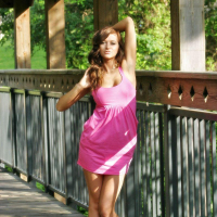 Pictures of teen girl London Hart teasing in a pink dress