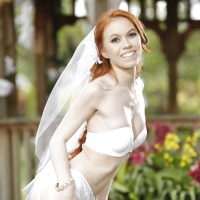 Redhead teen babe Dolly Little stripping off wedding dress outdoors