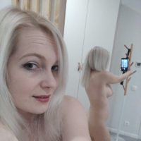 Hot blonde mature shows her big nipples