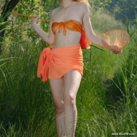 Cutie in orange bikini