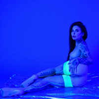 Busty Joanna Angel reveals her sexy tattooed body
