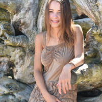 Slim beauty Maxa Saloma strips off her summer dress outdoors
