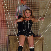 Naughty Trisha Uptown is a strung up doll