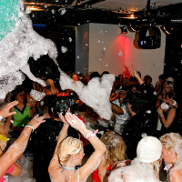 Filthy MILFs have some lesbian and blowjob fun at the wild foam party