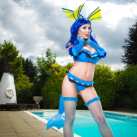 MILF pornstar Alexa Tomas strutting by swimming pool in cosplay outfit