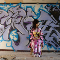 Asian Chiaki sucks cock showing her sexy legs under colorful kimono