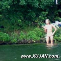 Hot naked blonde is eager to get into the water