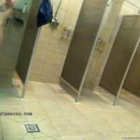 Enjoying her kinky time alone in the public shower
