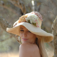Stunning blonde beauty Hayley Marie posing outdoors