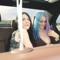 Sia Siberia and Little Reislin exposed on backseat
