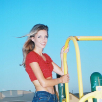 Ashley is outside on the play ground in tight jeans and a tiny red top I love to