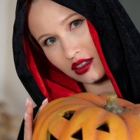 Lovely girl Stella Cardo puts on her new costume for Halloween