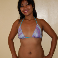 Naughty Asian babe teasing in a bikini
