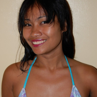 Naughty Asian babe teasing in a bikini