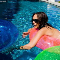 Catalina Cruz spreading in the pool