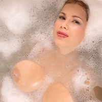 Terry Nova washing her massive natural boobs in bath