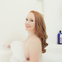 Lucy Ohara has fun in the bath and shows more then just her bubbles