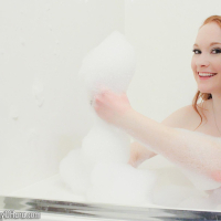 Lucy Ohara has fun in the bath and shows more then just her bubbles