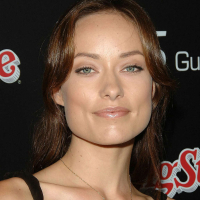 Olivia Wilde exposing her nice tits in see thru and posing very sexy