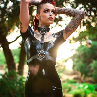 Leigh Raven peels off her skintight shiny latex dress