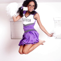 Tia Cyrus lifts up sexy cheerleader uniform to flash pretty panties